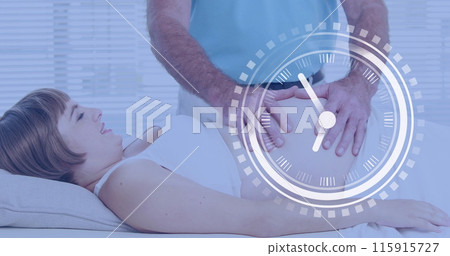 Fast moving clock over happy pregnant caucasian woman having belly massaged by husband 115915727