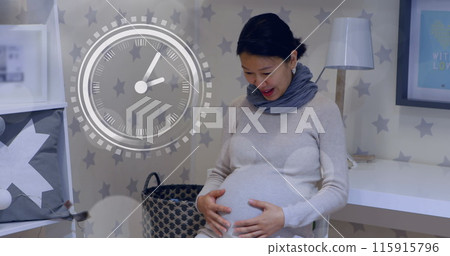 Fast moving clock and bokeh lights over happy a pregnant asian woman rubbing belly Fast moving clock and bokeh lights over happy a pregnant asian woman rubbing belly 115915796