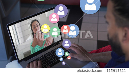 Image of profile icons floating against rear view of biracial man having a image call on laptop Image of profile icons floating against rear view of biracial man having a image call on laptop 115915811