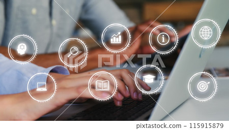 Image of multiple icon in circles over diverse coworkers using laptop and cellphone in office Image of multiple icon in circles over diverse coworkers using laptop and cellphone in office 115915879