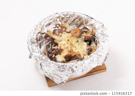 Brown mushrooms baked with cheese Brown mushrooms baked with cheese 115916317