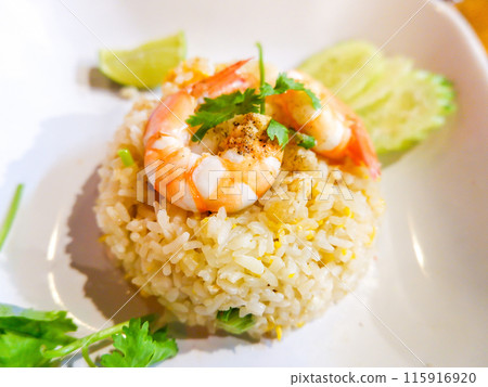 Close up of fried rice with shrimp in a white plate Close up of fried rice with shrimp in a white plate 115916920