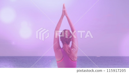 Image of spots over caucasian woman practicing yoga Image of spots over caucasian woman practicing yoga 115917205