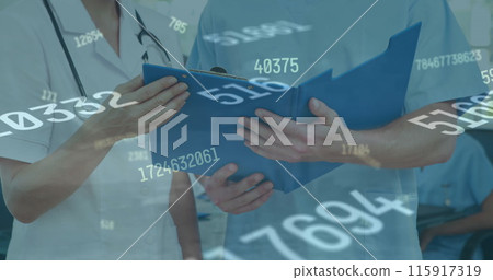 Image of financial data processing over diverse doctors Image of financial data processing over diverse doctors 115917319