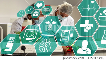 Image of scientific icons in hexagons over diverse female and male lab workers in face masks Image of scientific icons in hexagons over diverse female and male lab workers in face masks 115917396