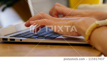 Image of falling social media icons over caucasian women Image of falling social media icons over caucasian women 115917437