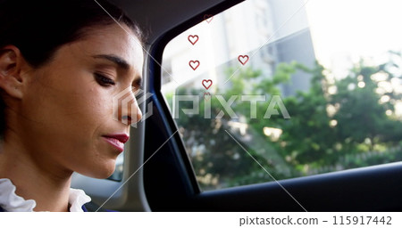 Multiple red heart icons floating against close up of caucasian woman smiling in the car Multiple red heart icons floating against close up of caucasian woman smiling in the car 115917442