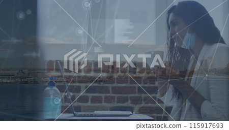 Image of connections over caucasian woman in face mask in office Image of connections over caucasian woman in face mask in office 115917693
