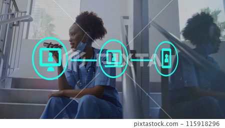 Image of media icons over african american female doctor using smartphone 115918296