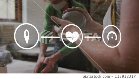 Image of media icons over caucasian workers doing pottery Image of media icons over caucasian workers doing pottery 115918317