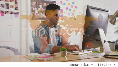 Image of world map and data processing over biracial businessman using computer Image of world map and data processing over biracial businessman using computer 115918817