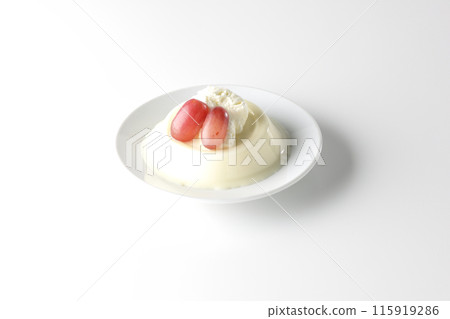 Panna cotta with cream and grapes photographed on a white background Panna cotta with cream and grapes photographed on a white background 115919286
