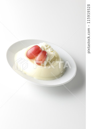 Panna cotta with cream and grapes photographed on a white background 115919328