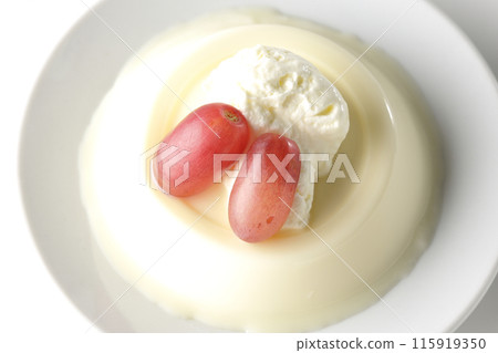 Panna cotta with cream and grapes photographed on a white background 115919350