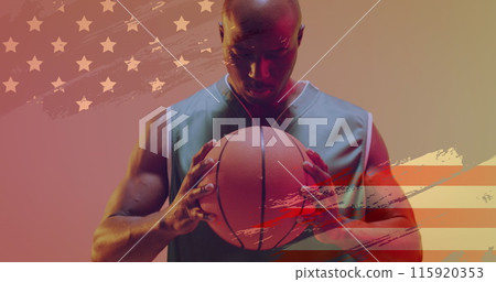 Image of american flag over focused african american male basketball player holding ball 115920353