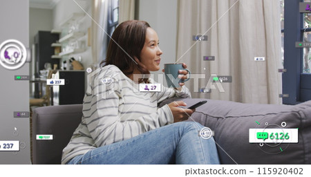 Image of social media text and icons over caucasian woman with smartphone at home Image of social media text and icons over caucasian woman with smartphone at home 115920402