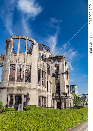The Atomic Bomb Dome, a World Heritage Site, shines against the blue sky 115921169