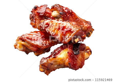 Delicious crispy Maple Bacon chicken wings garnished with fresh cilantro, great for appetizers or main meals Delicious crispy Maple Bacon chicken wings garnished with fresh cilantro, great for appetizers or main meals 115921469