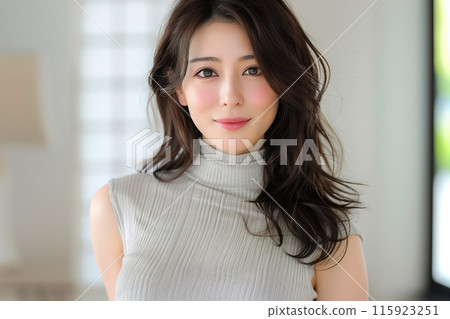 A beautiful witch wearing a turtleneck 115923251