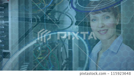 Image of data processing over caucasian woman smiling in server room Image of data processing over caucasian woman smiling in server room 115923648
