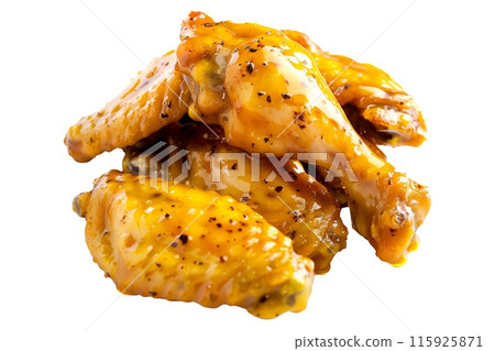 Delicious crispy honey Mustard chicken wings garnished with fresh cilantro, great for appetizers or main meals Delicious crispy honey Mustard chicken wings garnished with fresh cilantro, great for appetizers or main meals 115925871