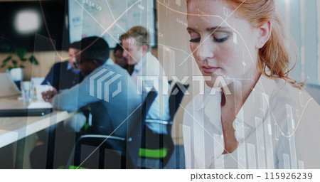 A female executive is using a digital tablet at her office 115926239