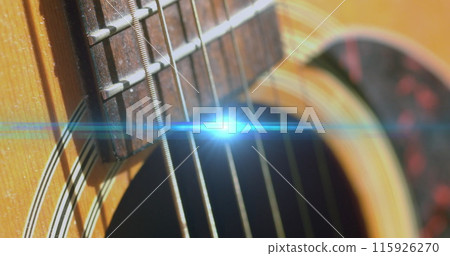 Image of light flashing over guitar strings moving Image of light flashing over guitar strings moving 115926270