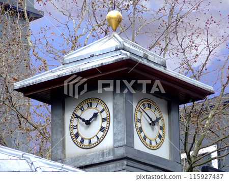 Two clocks under the roof 115927487