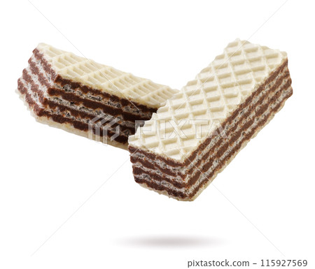 Sweet wafers flying close-up on a white background. Isolated Sweet wafers flying close-up on a white background. Isolated 115927569