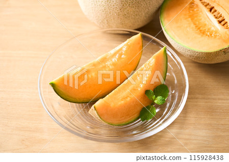 Sliced red flesh melon: Asahi melon from Hokkaido Sliced red flesh melon: Asahi melon from Hokkaido 115928438