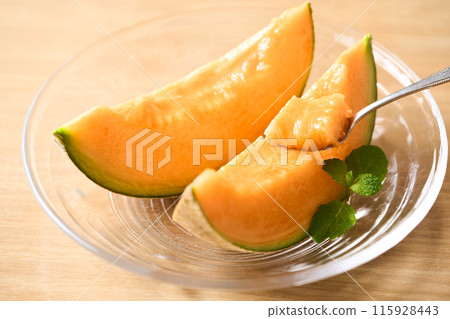 Sliced red flesh melon: Asahi melon from Hokkaido Sliced red flesh melon: Asahi melon from Hokkaido 115928443