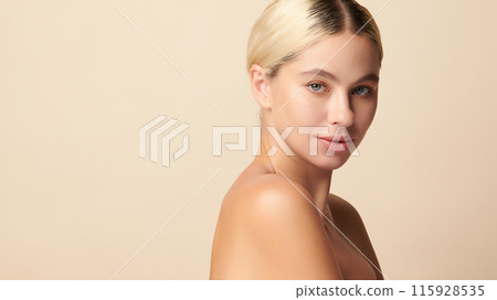 Beautiful young woman with clean fresh skin on beige background, Face care, Facial treatment, Cosmetology, beauty and spa, women portrait. 115928535