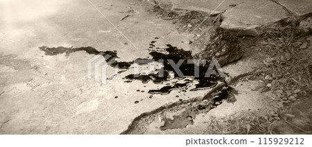 Bloodied stone lies on the ground Bloodied stone lies on the ground 115929212