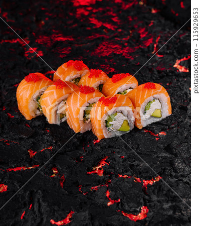 Gourmet salmon sushi on lava-inspired texture Gourmet salmon sushi on lava-inspired texture 115929653