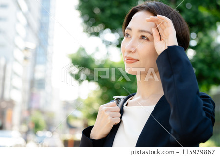 A woman in the sun 115929867