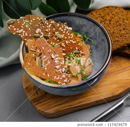 Gourmet chicken liver pate with crispy bread 115929879