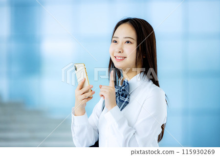 High school girl operating a smartphone 115930269