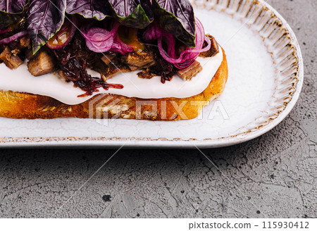 Gourmet toast with purple basil and cream Gourmet toast with purple basil and cream 115930412