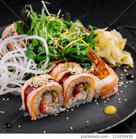 Gourmet sushi platter on black slate Gourmet sushi platter on black slate 115930439