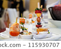 Buffet meals in luxury hotels often include a variety of food options from all over the world. 115930707