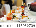 Buffet meals in luxury hotels often include a variety of food options from all over the world.    115930709