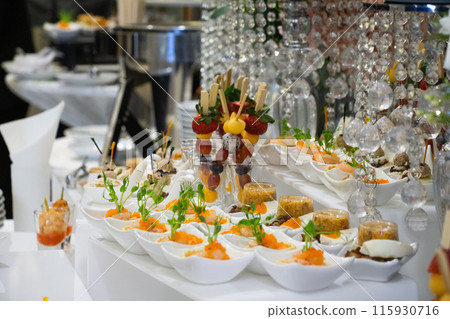 Buffet meals in luxury hotels often include a variety of food options from all over the world.    115930716