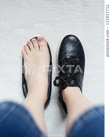 Foot deforming shoes. Incorrect anatomical shoes with flat soles. Small insole size, which causes foot pain. Cause of valgus, calluses, ingrown toenails 115931712