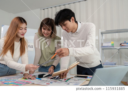 Creative UX Developer and UI Designer Team Brainstorming Innovative Ideas in Modern Office Environment 115931885