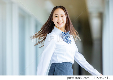 High school girl in a shirt looking back 115932319