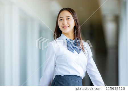 High school girl in a shirt looking back 115932320