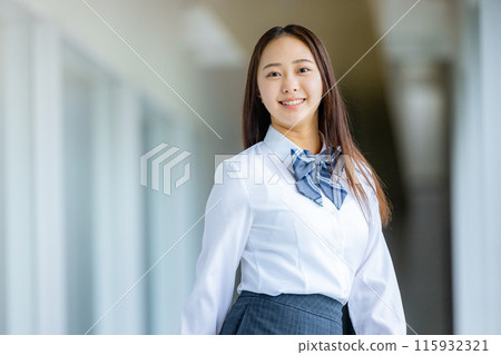 High school girl in a shirt looking back 115932321