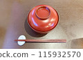 Red bowl and chopsticks 115932570