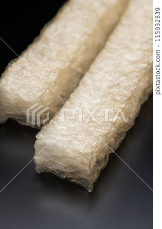 Domestically produced natural cubes of agar on a black background Domestically produced natural cubes of agar on a black background 115932839