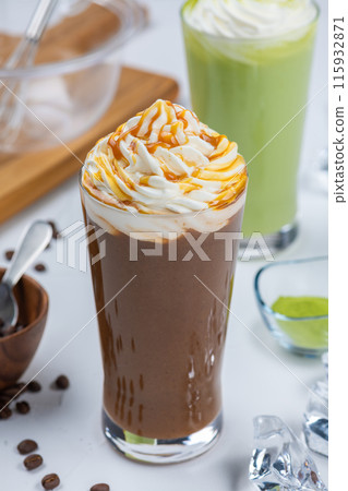 Caramel frappe and matcha frappe on white table Caramel frappe and matcha frappe on white table 115932871